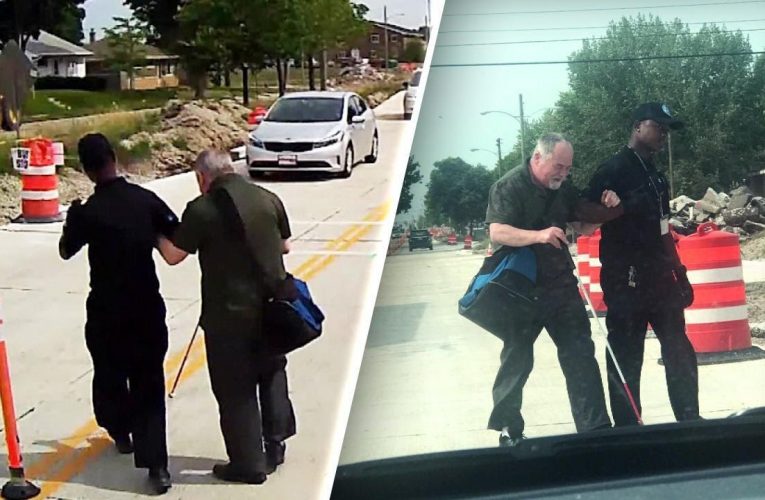 Kind Bus Driver Stopped Bus To Help Walk A Blind Man Safely Through Street Construction